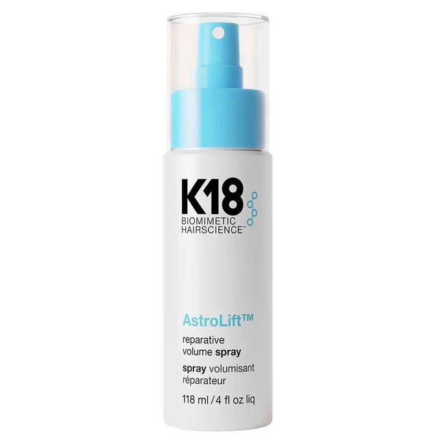 Discover the K18 Biomimetic Hairscience AstroLift Reparative Volume Spray, a revolutionary lightweight mist designed to elevate your hair care routine. This 118ml volume spray lifts roots and thickens strands, all while repairing damage over time with the power of K18PEPTIDE. Enjoy fuller, softer, and more resilient hair without the stiffness. Perfect for fine or fragile hair, it delivers long-lasting, natural-looking volume. Plus, it's cruelty-free and vegan-friendly, making it an ethical choice for your beauty regimen.