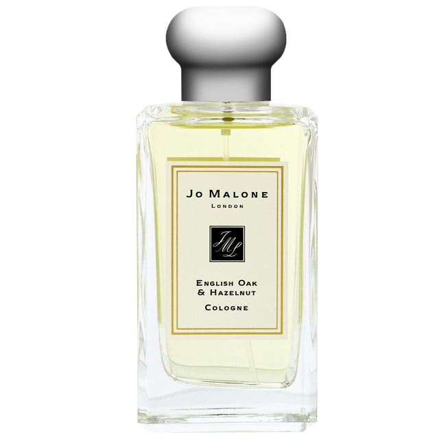 Jo Malone English Oak & Hazelnut Unisex Eau de Cologne Spray - 302g Discover the enchanting Jo Malone English Oak & Hazelnut Eau de Cologne, a unisex fragrance that captivates the senses. Launched in 2017, this exquisite scent features a delightful blend of nutty Green Hazelnut and warm Cedarwood, creating a spicy, woody aroma. The base notes of Roasted Oak add depth and richness, making it perfect for any occasion. Experience luxury with every spritz of this 302g cologne, ideal for those who appreciate sophisticated fragrances. Elevate your scent collection with Jo Malone today!