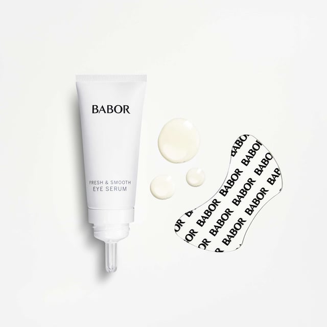Revitalize your eyes with the BABOR Skinovage Instant Fresh & Smooth Eye Serum and Patches set. This duo features a 15ml eye serum that delivers intense moisture for refreshed and smooth skin. The reusable silicone eye patches enhance the serum's effects by providing an occlusive layer for added hydration. With soothing aloe vera and plumping hyaluronic acid, this treatment is ideal for women seeking a youthful glow. Experience the firming effect and elevate your skincare routine!