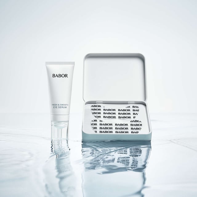Revitalize your eyes with the BABOR Skinovage Instant Fresh & Smooth Eye Serum and Patches set. This duo features a 15ml eye serum that delivers intense moisture for refreshed and smooth skin. The reusable silicone eye patches enhance the serum's effects by providing an occlusive layer for added hydration. With soothing aloe vera and plumping hyaluronic acid, this treatment is ideal for women seeking a youthful glow. Experience the firming effect and elevate your skincare routine!