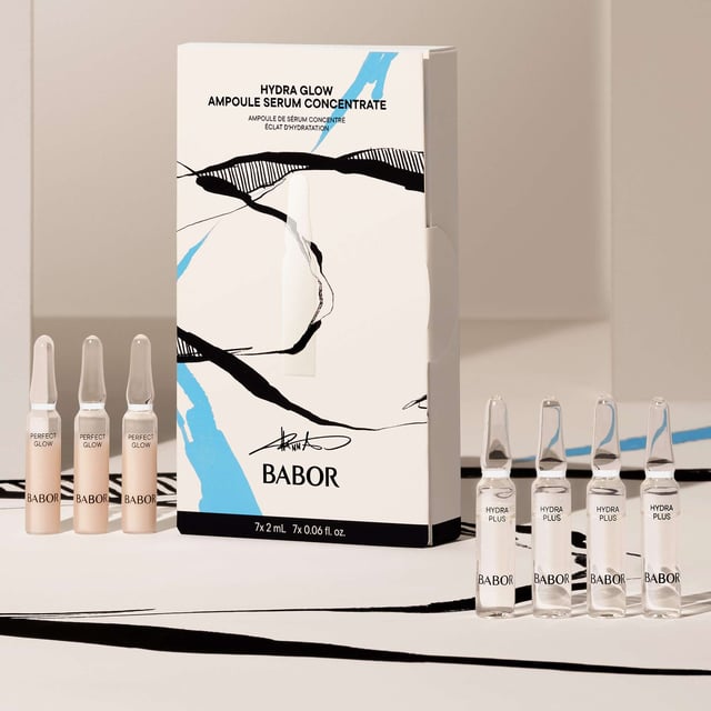 BABOR Hydra Glow Ampoules Set for Radiant Skin Experience ultimate hydration with the BABOR Hydra Glow Ampoules Set, designed to transform your skin in just 7 days. Featuring low-molecular hyaluronic acid and ProVitamin B5, this set deeply moisturizes and plumps the skin, reducing dryness and fine lines. The Perfect Glow active ingredients enhance your complexion, making your skin smoother and more radiant. Regular use will even your skin tone, refine pores, and give a fresh, rosy appearance. This set includes four 2ml BABOR Hydra Plus ampoules and three 2ml BABOR Perfect Glow ampoules, suitable for all skin types.