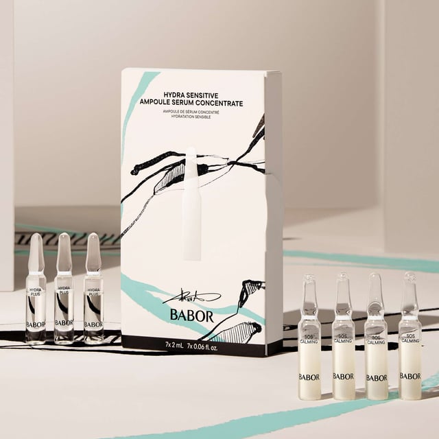 Experience the ultimate in skin soothing with the BABOR Hydra Sensitive Ampoules Set. This intensive treatment series enhances hydration and revitalizes your skin in just 7 days. The Hydra Plus ampoule features low-molecular hyaluronic acid and ProVitamin B5 to combat dryness, while the SOS Calming complex with aloe vera effectively alleviates redness and tightness. Ideal as an aftersun treatment, this unisex set includes four 2ml BABOR SOS Calming ampoules and three 2ml BABOR Hydra Plus ampoules, perfect for restoring your skin's natural balance.