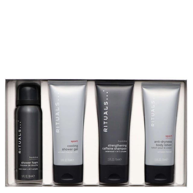 Discover the Rituals Homme Small Gift Set, a luxurious collection designed for the modern man. This set includes a 70ml Rituals Sport Anti-Dryness Body Lotion, a 50ml Rituals Homme Shower Foam, a 70ml Rituals Homme Strengthening Caffeine Shampoo, and a 70ml Rituals Sport Cooling Shower Gel. Each product is crafted to nourish, refresh, and energize your skin and hair. Enjoy the invigorating scents of bergamot, cedar, and mint while indulging in a revitalizing shower experience. Perfect as a gift or a personal treat, this set is ideal for any man who values quality self-care.