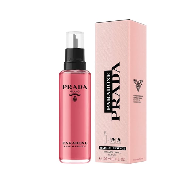 Experience the captivating allure of Prada Paradoxe Parfum Refill 100ml, a revolutionary feminine fragrance that redefines gourmand scents. This exquisite perfume features an enchanting blend of Neroli Oil and Orange Flower Heart Absolute, creating a sweet, floral essence. The heart unveils an unexpected Salted Pistachio Accord, delivering addictive roasted and salty notes. At its base, a creamy Sandalwood Accord adds sophistication for a sensual and modern fragrance trail. Encased in a stunning bottle with deep pink lacquering, this scent embodies the essence of elegance and intensity.