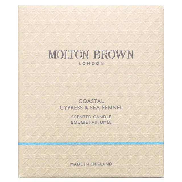 Experience the refreshing essence of the ocean with the Molton Brown Coastal Cypress & Sea Fennel Scented Candle. Launched in 2017, this luxurious candle features a captivating blend of top notes including fig leaves, cardamom, and bergamot. The heart reveals delicate jasmine, violet leaf, and marine notes, while the base offers a warm embrace of salted cypress, cedar wood, and musk. This cruelty-free candle is perfect for creating a soothing atmosphere in any space, making it an ideal gift for candle enthusiasts.