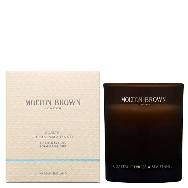 Experience the refreshing essence of the ocean with the Molton Brown Coastal Cypress & Sea Fennel Scented Candle. Launched in 2017, this luxurious candle features a captivating blend of top notes including fig leaves, cardamom, and bergamot. The heart reveals delicate jasmine, violet leaf, and marine notes, while the base offers a warm embrace of salted cypress, cedar wood, and musk. This cruelty-free candle is perfect for creating a soothing atmosphere in any space, making it an ideal gift for candle enthusiasts.