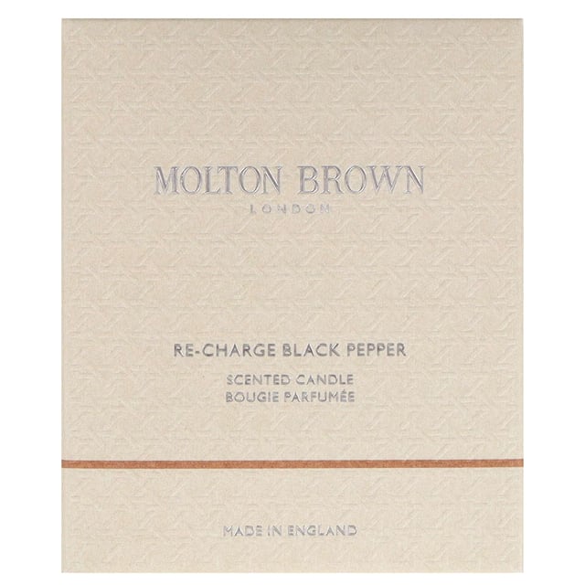 Experience the captivating aroma of the Molton Brown Re-Charge Black Pepper Candle, a luxurious addition to your home ambiance. Launched in 2015, this candle features a bold blend of spicy black pepper, zesty lemon, and warming ginger at its top. The heart reveals herbal notes of coriander, basil, and violet leaf, while the base is anchored by earthy vetiver, rich oakmoss, and the sophisticated scent of ambergris. Crafted by the cruelty-free brand Molton Brown, this exquisite candle is perfect for creating an inviting atmosphere.