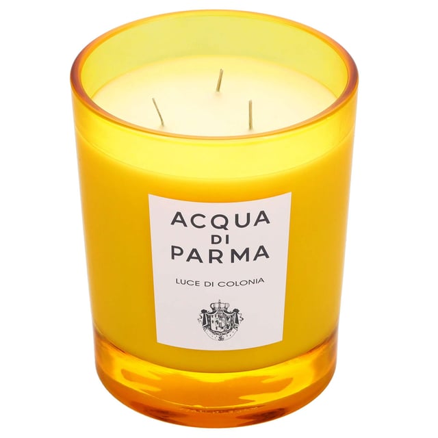 Experience the enchanting Luce Di Colonia Candle from Acqua Di Parma, a luxurious 500g candle that infuses your space with a radiant citrus fragrance. Inspired by the iconic Colonia scent, it features refreshing notes of orange, lemon, petitgrain, and neroli, harmonized with earthy vetiver and patchouli. This beautifully crafted candle offers an impressive burn time of up to 70 hours, making it perfect for creating a warm and inviting atmosphere in any room. Elevate your home with this exquisite fragrance that delights the senses.