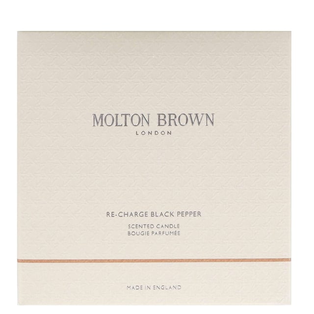 Indulge your senses with the Molton Brown Re-Charge Black Pepper Candle, a captivating home fragrance launched in 2015. This exquisite 600g candle features an aromatic blend that opens with invigorating top notes of black pepper, lemon, and ginger. The heart reveals a sophisticated mix of coriander, basil, and violet leaf, while the base is enriched with earthy vetiver, oakmoss, and luxurious ambergris. Perfect for creating a warm and inviting atmosphere, this cruelty-free candle is a must-have for any home fragrance enthusiast.