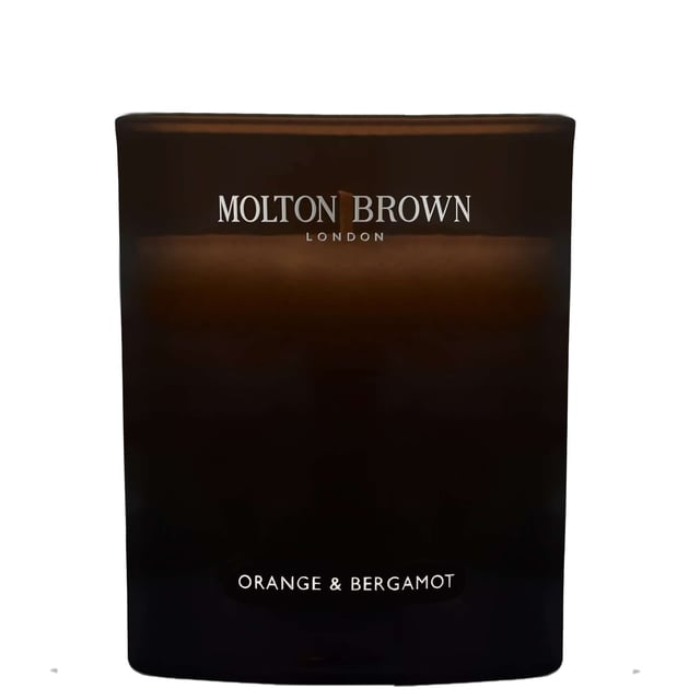 Experience the enchanting aroma of the Molton Brown Orange & Bergamot Candle, a luxurious addition to your home. Launched in 2015, this exquisite candle features a vibrant blend of citrus notes, including fresh orange, bergamot, and mandarin at the top, with a heart of neroli, cardamom, and galbanum. The warm base notes of musk, ylang-ylang, and cedarwood create a soothing ambiance. This cruelty-free candle is perfect for gifting or enhancing your own space, ensuring a delightful sensory experience.