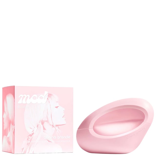 Experience the allure of Ariana Grande MOD Blush Eau de Parfum Spray, a captivating fragrance designed for the modern woman. This 100ml vegan and cruelty-free perfume offers a unique blend of intoxicating scents that celebrate individuality and self-expression. With top notes of Italian Bergamot, passion fruit, and raspberry, it transitions into a luxurious heart of dewy Rose Petals and Magnolia, enhanced by a hint of pear. The seductive base notes of Ambrox, Dreamwood, and musks create a lasting impression. Elevate your fragrance collection with this exquisite scent.