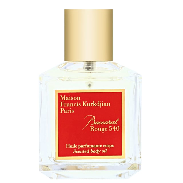 Indulge in the exquisite Maison Francis Kurkdjian Baccarat Rouge 540 Scented Body Oil. This luxurious body oil envelops your skin in an intoxicating fragrance that blends earthy woods with rich amber. The top notes of saffron and jasmine create a fresh and alluring aroma, while the heart reveals comforting amberwood and ambergris. Finally, the base notes of fir resin and cedar provide a warm, sophisticated finish. Perfect for women who appreciate elegance and refinement, this 70ml body oil is a must-have addition to your bath and body collection.