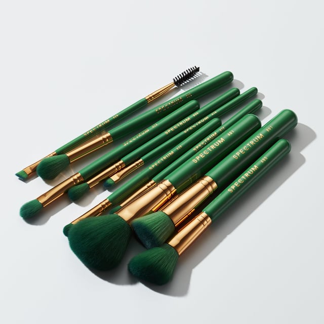 Elevate your makeup routine with the Spectrum 10 Piece Malachite Green Makeup Brush Set, designed for the modern woman. This stunning set features a rich emerald green finish with elegant gold accents, perfect for any beauty enthusiast. Each brush is crafted with silky-soft synthetic bristles that ensure smooth application and blending of products for a flawless look. With brushes for foundation, blush, contour, highlighter, eyes, and brows, you have everything you need to express your creativity. Experience the purifying energy of malachite while you create your perfect makeup masterpiece.
