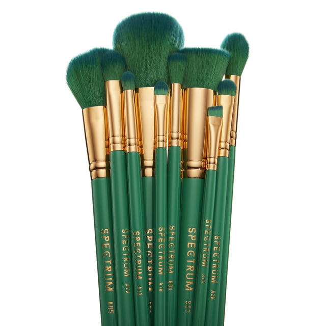 Elevate your makeup routine with the Spectrum 10 Piece Malachite Green Makeup Brush Set, designed for the modern woman. This stunning set features a rich emerald green finish with elegant gold accents, perfect for any beauty enthusiast. Each brush is crafted with silky-soft synthetic bristles that ensure smooth application and blending of products for a flawless look. With brushes for foundation, blush, contour, highlighter, eyes, and brows, you have everything you need to express your creativity. Experience the purifying energy of malachite while you create your perfect makeup masterpiece.