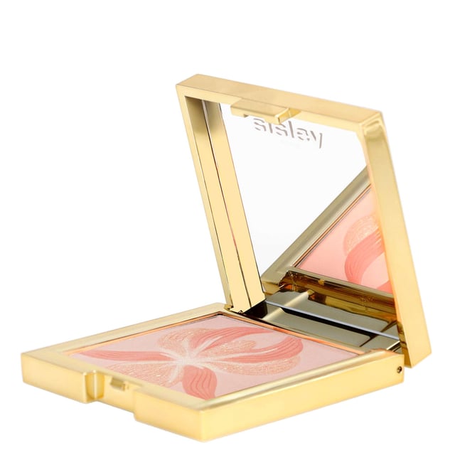 Elevate your makeup game with the Sisley L'Orchidée Highlighter Blush in Corail / Orange. This luxurious blush is designed to enhance your complexion with a vibrant layer of color, offering a sheer and luminous finish. Featuring a unique blend of three complementary shades, it utilizes micronized pigments for an immediate brightening effect while evening out your skin tone and sculpting your face beautifully. Perfect for women seeking a flawless, radiant look, this 15g blush is a must-have in your cosmetics collection.