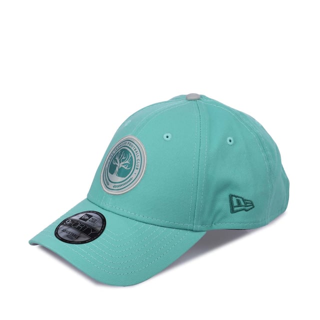 New Era Core 9FORTY Los Troncos Cap in turquoise.- Adjustable metal closure.- Curved visor.- Contoured crown.- Embroidered New Era flag at left.- Embroidered Celtic crest.- 100% Cotton.- Ref: 60603648
