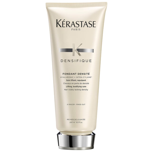 Revitalize your hair with Kérastase Densifique Fondant Densité, a luxurious lightweight conditioner that enhances texture, substance, and resilience. This silky formula detangles and replenishes, providing an immediate bodifying effect for hair that feels light and fluid. Apply a quarter-size amount to wet, shampooed hair, focusing on mid-lengths and ends. Leave on for 2-3 minutes before rinsing thoroughly. Kérastase is dedicated to sustainability, using recycled materials and achieving carbon neutrality in production. Experience the perfect blend of care and innovation.