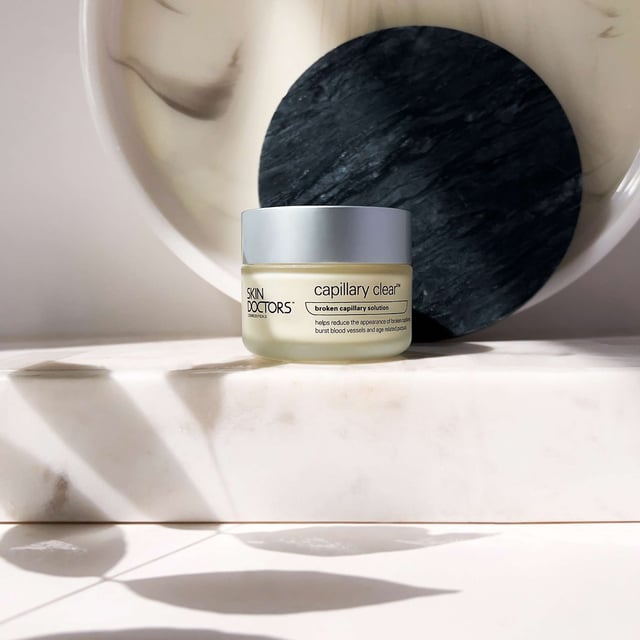 Transform your skin with Skin Doctors Capillary Clear, a specialized facial care cream designed to visibly reduce broken capillaries and redness in just 4-6 weeks. This powerful formula contains natural skin lightening agents that help promote a balanced and even complexion. Key active ingredient Phytotonine, derived from Arnica, Cypress, and Solomon’s Seal, enhances microcirculation and strengthens capillary walls. Ideal for those with blemished skin, this cream targets trouble areas and supports overall skin health. Experience the confidence of clear, radiant skin today.