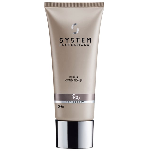 Revitalize your hair with System Professional Repair R2 Conditioner, designed specifically for women with weak and brittle hair. This ultra-fast conditioning treatment delivers professional results in just 30 seconds, restoring strength and manageability to color-treated and damaged locks. Enjoy enhanced smoothness and easier combing while deeply nourishing your hair fiber. To use, simply apply a coin-sized amount to towel-dried hair, comb through, and rinse after 30 seconds. Transform your hair care routine with this essential product for healthy, vibrant hair.