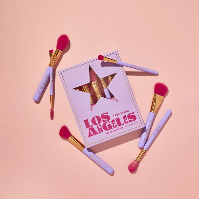 Elevate your beauty routine with the Spectrum Los Angeles 6-Piece Makeup Brush Set, designed for the stylish traveler. This luxurious brush set includes six essential tools for flawless face and eye makeup application, perfectly sized to fit in your carry-on. Whether you're jet-setting to glamorous destinations or simply want to bring a touch of elegance to your daily routine, these brushes are a must-have. Crafted for women who appreciate quality and design, this set is your perfect travel companion.