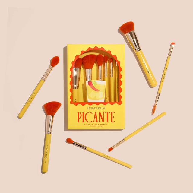 Elevate your makeup routine with the Spectrum Picante 6 Piece Brush Set, inspired by vibrant cocktails. This essential collection features brushes for face, eyes, and brows. Achieve a flawless finish with the B13 foundation brush and sculpt cheeks with the A05 cheek brush. Brighten under eyes with the versatile B08 brush, blend eyeshadow with the B06 blending brush, and define your crease with the A12 fluffy pencil. Groom brows to perfection with the A24 brow styler. Perfect for women who love colorful beauty tools.