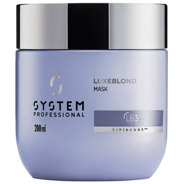Transform your blonde hair with the System Professional LuxeBlond Hair Mask, expertly designed to reduce breakage by up to 99%. This regenerating formula not only strengthens your hair from within but also instantly neutralizes unwanted brassy and yellow tones, achieving the perfect cool blonde look. Infused with LipidCode Complex and violet pigments, it revitalizes and nourishes your blonde strands, enhancing their natural beauty. Suitable for women, this 200ml hair mask is a must-have for anyone seeking luxurious, healthy blonde hair.