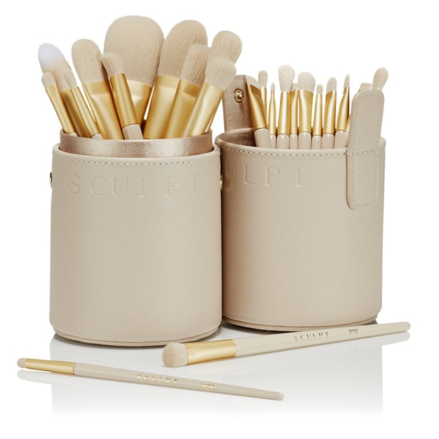 Elevate your beauty routine with the Spectrum Sculpt 30 Piece Professional Makeup Brush Set, crafted in collaboration with renowned makeup artist Ash K Holm. This luxurious set features 30 meticulously designed brushes made from high-quality materials. Each brush is hand-measured for balance, while the elegant FSC wood handles and premium Luxture synthetic fibres ensure durability. Encased in a stylish tube bag, this brush set is perfect for artists and beauty enthusiasts, providing essential tools for stunning looks.
