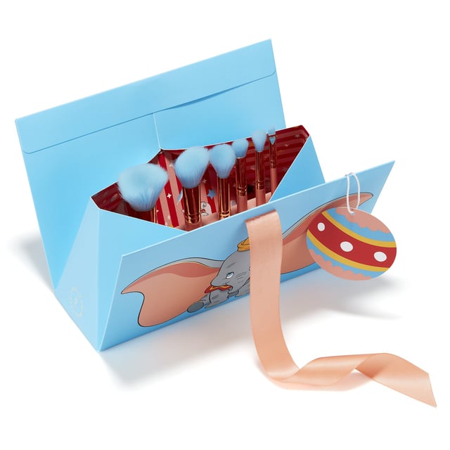 Spectrum Disney Dumbo 6 Piece Mini Makeup Brush Set for Women - 110 grams Elevate your makeup routine with the Spectrum Disney Dumbo 6 Piece Mini Makeup Brush Set. This enchanting set features six expertly crafted mini brushes designed for foundation, cheeks, eyes, and brows, making it ideal for any makeup enthusiast. Each brush is beautifully themed after Dumbo, adding a touch of Disney magic to your beauty collection. Packaged in eco-friendly, gift-ready packaging, it's the perfect gift for yourself or a loved one. Experience seamless application and playful charm with every brush stroke.