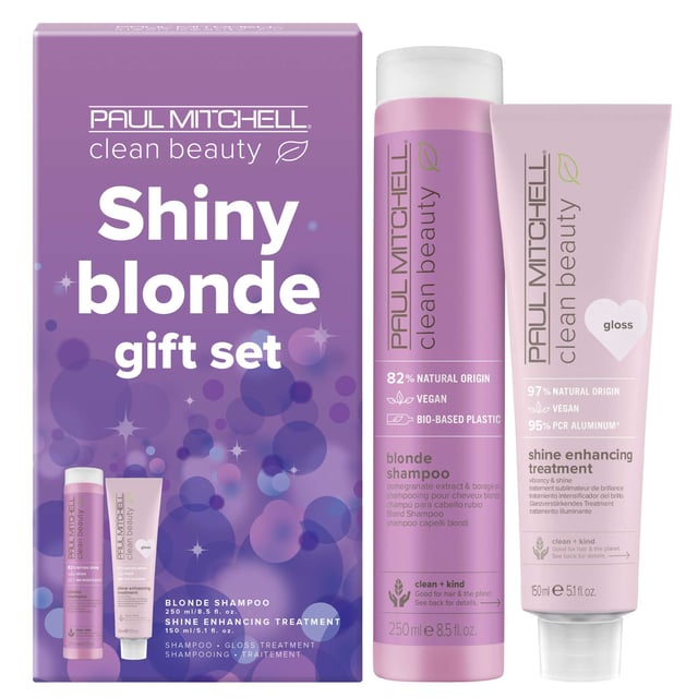 Discover the ultimate hair care experience with the Paul Mitchell Shiny Blonde Gift Set. This luxurious set features Clean Beauty Blonde Shampoo (250ml) and Shine Enhancing Treatment Gloss (150ml), designed for blonde, highlighted, silver, or grey hair. The purple toning shampoo cleanses while eliminating brassy tones, infused with pomegranate extract to prevent color fade. The treatment gloss nourishes each strand with borage oil, delivering a smooth finish and natural shine. Perfect for vegans, this set revitalizes your hair, making it vibrant and beautiful.