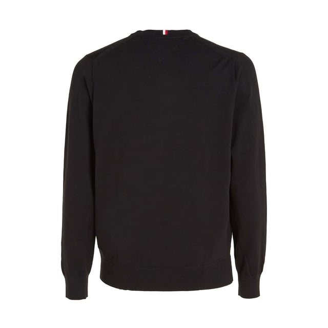 Tommy Hilfiger - "1985" Pullover Top Rundhalsausschnitt für Herren (Schwarz) 81% Bio-Baumwolle, 19% Polyester. Gewebe: Jerseyware. Design: Gesticktes Logo, Unifarben. Saum: gerippt. Rundhalsausschnitt, gerippt. Langärmlig. Bündchen: gerippt. Zum Überziehen. XS: 86,36 cm. S: 96,52 cm. M: 102 cm. L: 107 cm. XL: 112 cm. XXL: 116,84 cm.