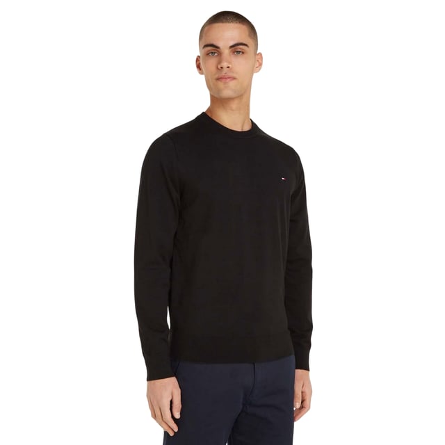 Tommy Hilfiger - "1985" Pullover Top Rundhalsausschnitt für Herren (Schwarz) 81% Bio-Baumwolle, 19% Polyester. Gewebe: Jerseyware. Design: Gesticktes Logo, Unifarben. Saum: gerippt. Rundhalsausschnitt, gerippt. Langärmlig. Bündchen: gerippt. Zum Überziehen. XS: 86,36 cm. S: 96,52 cm. M: 102 cm. L: 107 cm. XL: 112 cm. XXL: 116,84 cm.