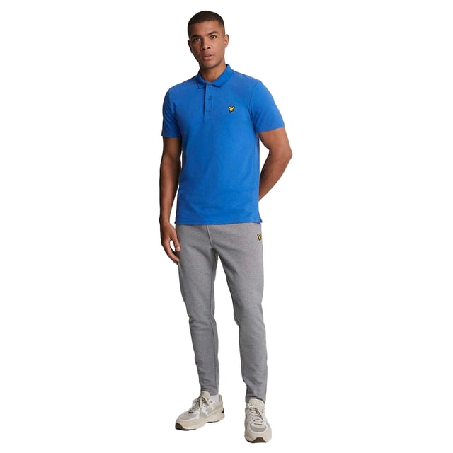 49% Katoen, 47% Polyester, 4% Elastaan. Stof: Zachte aanraking. Ontwerp: Logo, eenvoudig. Manchet: Dubbel gestikt. Zoom: Dubbel gestikte naden. Halsuitsnijding: Geribd, Omgeslagen kraag. Mouwtype: Ingezet, met korte mouwen. Stoftechnologie: Vochttransport. 3 knopenlijst. Geschikt: Regelmatig. XS: 34,5 in. S: 37 in. M: 39,5 in. L: 41,5 in. XL: 44 in.