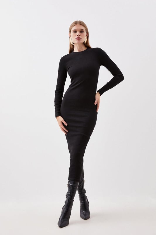 This staple piece is crafted with figure-forming jersey fabric for a sleek and sculpted look. Ribbed detailing adds a textural element while a round neck and long sleeves ensure a sophisticated mood. Style this maxi dress with strappy heels or boots to complete the look.Jersey ribbed fabricHigh neckLong sleevesMaxi dressDiscover this seasons jersey dresses or browse the full collection of women's dresses now.