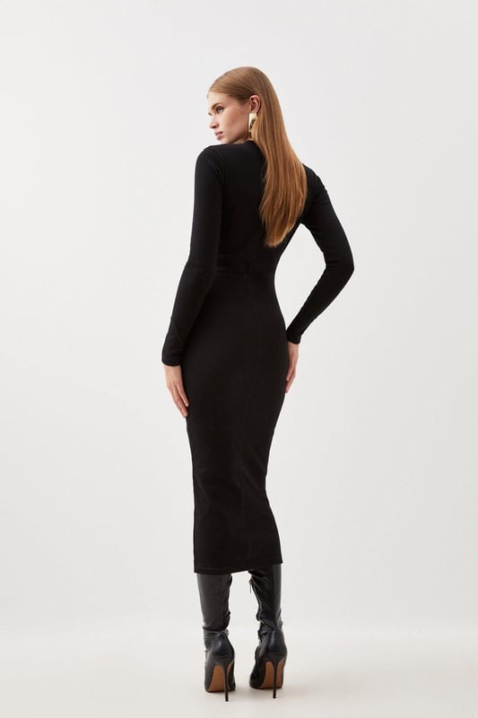 This staple piece is crafted with figure-forming jersey fabric for a sleek and sculpted look. Ribbed detailing adds a textural element while a round neck and long sleeves ensure a sophisticated mood. Style this maxi dress with strappy heels or boots to complete the look.Jersey ribbed fabricHigh neckLong sleevesMaxi dressDiscover this seasons jersey dresses or browse the full collection of women's dresses now.