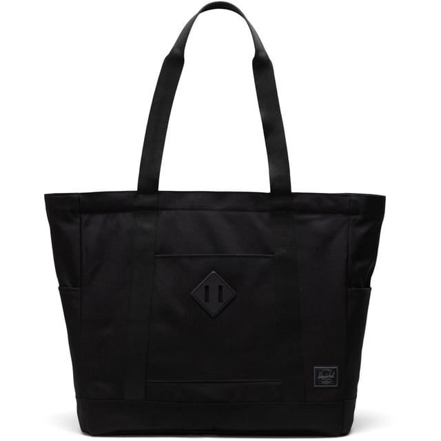 A timeless tote. Made with recycled fabrics and our signature diamond detail, this large tote is packed with organizing features that carry you through work, travel and everyday journeys.