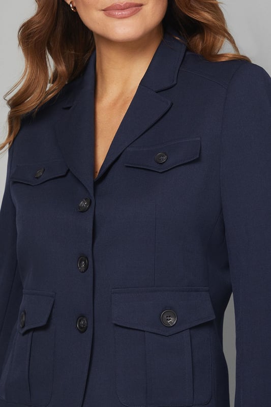Structured utility jacket featuring four practical front pockets with button closures
        Classic collared neckline with smart lapels for a sophisticated silhouette
        Button-through front fastening with contrasting buttons for added detail
        Tailored regular fit with slight stretch for comfortable all-day wear
        Neat cuff detailing with button accents for a polished finish
    
    This versatile Four Pocket Utility Jacket from Wallis combines practicality with sophisticated style. The structured silhouette offers a flattering shape whilst maintaining comfort through its regular fit and slight stretch. Style with wide-leg denim trousers and a simple white tee for an effortlessly chic daytime look, perfect for weekend brunches or casual shopping trips. Add a leather belt to define the waist and complement with ankle boots for a coordinated ensemble. The neutral tone makes this jacket an excellent layering piece for transitional weather, working beautifully over lightweight jumpers or simple tops. For family gatherings or lunch dates, pair with tailored trousers and ballet flats for a smart-casual outfit that conveys understated elegance. This jacket will quickly become a cornerstone of your casual wardrobe, offering both functionality and style.