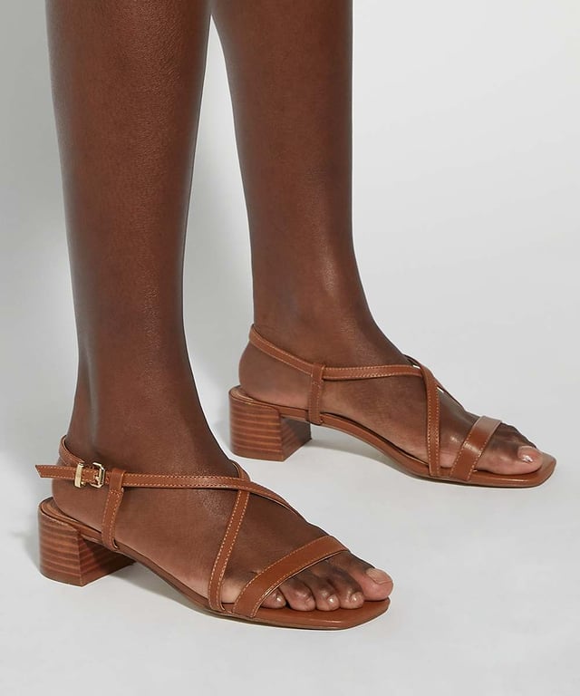 Dune Ladies Jaskell - Low Block Heel Sandals Underpin your warm-weather styling with our wear-with-everything Jaskell sandals. Set on a low block heel for ease of wear, this design is certain to become the foundation of your day-to-day ensembles. Finished with a side buckle, this versatile design will seamlessly take you from the boardroom to dinner.