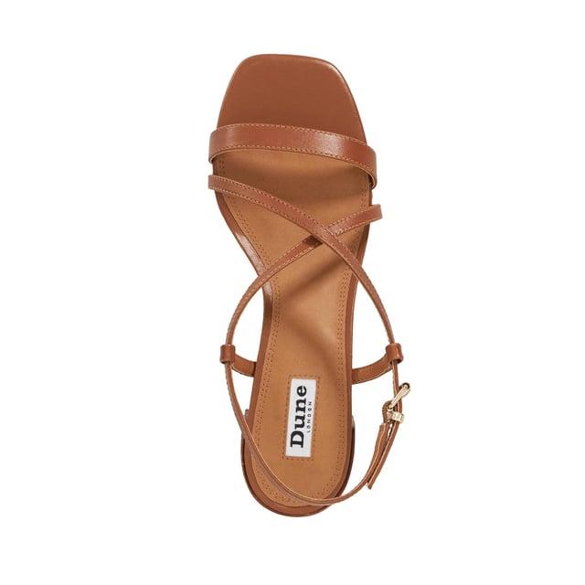 Dune Ladies Jaskell - Low Block Heel Sandals Underpin your warm-weather styling with our wear-with-everything Jaskell sandals. Set on a low block heel for ease of wear, this design is certain to become the foundation of your day-to-day ensembles. Finished with a side buckle, this versatile design will seamlessly take you from the boardroom to dinner.