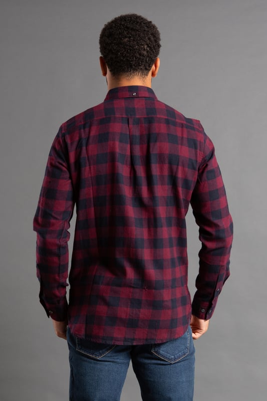 This long sleeve, gingham flannel shirt from French Connection is a go-to. Features large gingham checks, French Connection branding tab, chest pocket, button-down collar, and button cuffs. Made from cotton fabric to ensure high quality and comfortable wear. This shirt looks great buttoned up or open with a t-shirt underneath.