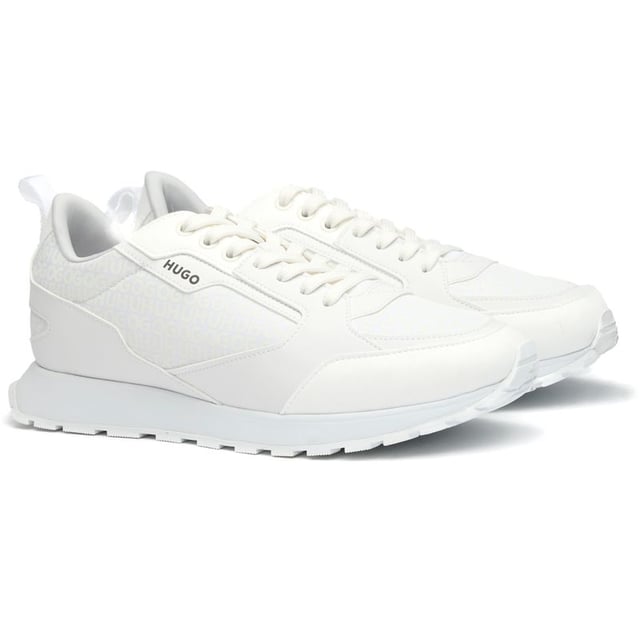 The Hugo Icelin offers a sleek, athletic silhouette that balances contemporary design with everyday comfort. These white trainers feature a durable nylon upper with sophisticated multi overlays for added dimension and style. HUGO's tonal branding creates a subtle premium touch, while the reliable rubber sole provides excellent traction. The contoured footbed ensures lasting comfort whether you're running errands or meeting friends for coffee. A versatile addition to any casual wardrobe.