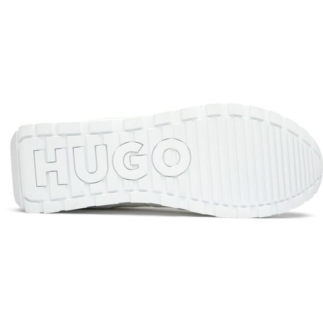 The Hugo Icelin offers a sleek, athletic silhouette that balances contemporary design with everyday comfort. These white trainers feature a durable nylon upper with sophisticated multi overlays for added dimension and style. HUGO's tonal branding creates a subtle premium touch, while the reliable rubber sole provides excellent traction. The contoured footbed ensures lasting comfort whether you're running errands or meeting friends for coffee. A versatile addition to any casual wardrobe.
