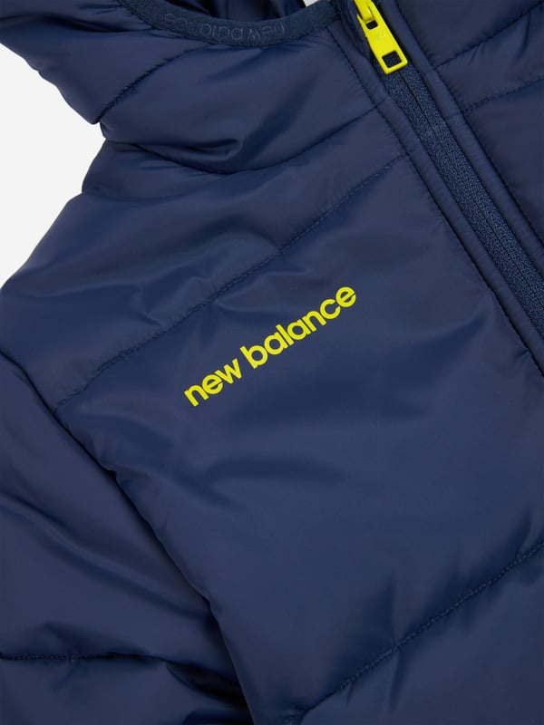 Introducing the exquisite Baby Boys Bond Quilted Graphic Jacket in Navy by New Balance, tailored specifically for AW2024. A fusion of luxury and practicality, this jacket provides unmatched warmth and style Quilted Comfort Ultra-soft padding ensures your child stays warm without bulk. Signature Graphic Unique, eye-catching design that celebrates youthful exuberance. Durable Navy Blue Fabric Perfect for active days and versatile enough for any occasion. High-Quality Zipper Smooth and easy to fasten, tailored for little hands.Elevate your youngster's fashion this season with this stylish staple.