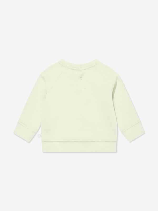 Stella McCartney portray a vibrant aesthetic via their cool and beautifully crafted designs. This baby unisex light mint green sweatshirt is woven with a colourful print of an ice cream cone showcasing smiley faces and a logo print in blue. Round Neckline Narrow Ribbed Edge Two Push Buttons Long Sleeves With Wide Ribbed Edges in the Sleeve and Waist Opening Main Material 100 Cotton Rib 98 Cotton 2 Elastane