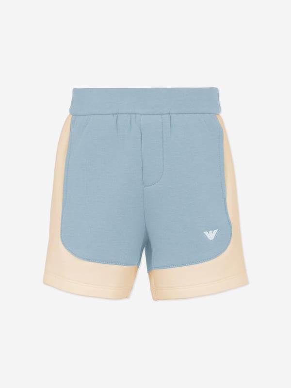 Baby Boys Colourblock Shorts in Blue Introducing the Emporio Armani Baby Boys Colourblock Shorts in Blue, a quintessential addition to your young chaps wardrobe for SS2025. Crafted with stylish comfort in mind, these shorts ensure your little one remains at the forefront of fashion. Key features include Distinctive Colourblock Design Striking blues merge for a fresh, eye-catching look. Premium Comfort Luxuriously soft fabrics ensure all-day ease for playful adventures. Iconic Branding Subtle Armani emblem adds a touch of elegance.Revitalise his summer attire with sophisticationperfect for sunny explorations!
