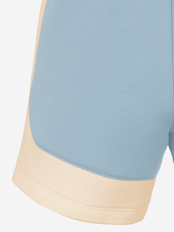 Baby Boys Colourblock Shorts in Blue Introducing the Emporio Armani Baby Boys Colourblock Shorts in Blue, a quintessential addition to your young chaps wardrobe for SS2025. Crafted with stylish comfort in mind, these shorts ensure your little one remains at the forefront of fashion. Key features include Distinctive Colourblock Design Striking blues merge for a fresh, eye-catching look. Premium Comfort Luxuriously soft fabrics ensure all-day ease for playful adventures. Iconic Branding Subtle Armani emblem adds a touch of elegance.Revitalise his summer attire with sophisticationperfect for sunny explorations!