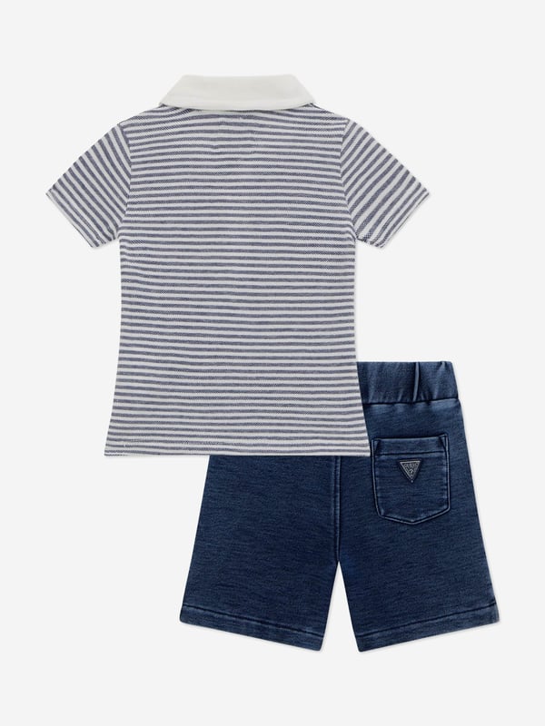 Introduce a touch of elegance to your little gentleman's wardrobe with the Baby Boys Polo Shirt and Short Set in Blue by Guess. Perfectly suited for the spring-summer season of 2025, this ensemble is crafted with both style and comfort in mind.Key Features Exquisite Craftsmanship Tailored using premium quality fabrics for unparalleled softness. Classic Blue Hue A versatile and timeless colour that enhances any occasion. Iconic Branding Adorned with the distinguished Guess logo, adding a hint of luxury. Seamless Pairing Coordinated pieces simplify stylish outfitting for any event.Revitalize your child's attire with this chic and comfortable set, ensuring they look their best for any adventure.