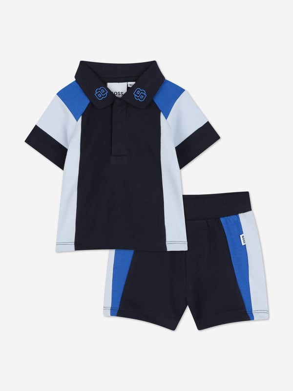 Introducing the exquisite BOSS Baby Boys Short Set in Navy, a quintessential addition to any young gentleman's wardrobe for SS2025. Crafted with precision by BOSS, this set is the epitome of both style and comfort. Key features include Elegant Navy Hue A classic and versatile colour perfect for any occasion. Superior Comfort Crafted from premium fabrics to ensure your little one enjoys supreme comfort. Designer Quality Impeccable BOSS craftsmanship guarantees a durable and stylish ensemble. Elevate your child's fashion ensemble with this luxurious set.