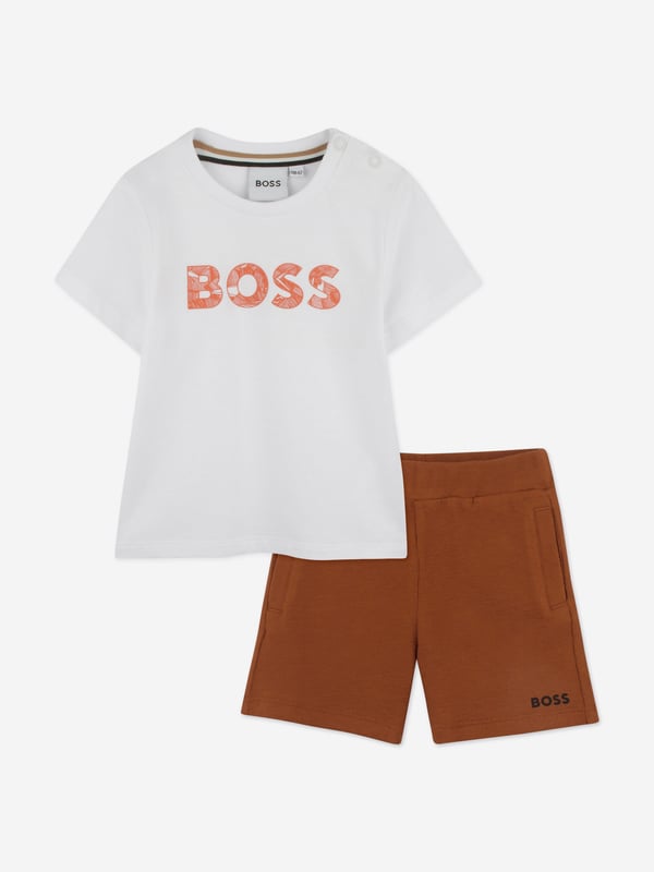 Introduce your little champ to the world of high fashion with the BOSS Baby Boys Short Set in Brown. Expertly crafted for the SS2025 season, this sophisticated ensemble promises to be a cornerstone in his budding wardrobe Luxe Fabrication Tailored from premium materials, ensuring both elegance and durability. Contemporary Design Features a chic, modern cut perfect for any fashionable occasion. Versatile Hue The rich brown shade offers remarkable versatility, complementing a variety of accessories.Elevate his style early with this exquisite set from BOSS. Perfect for making memorable impressions!