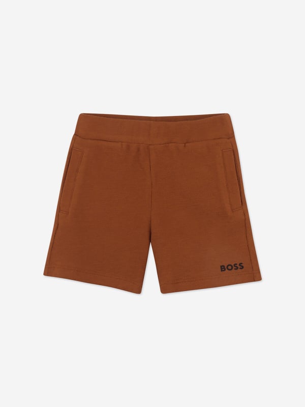 Introduce your little champ to the world of high fashion with the BOSS Baby Boys Short Set in Brown. Expertly crafted for the SS2025 season, this sophisticated ensemble promises to be a cornerstone in his budding wardrobe Luxe Fabrication Tailored from premium materials, ensuring both elegance and durability. Contemporary Design Features a chic, modern cut perfect for any fashionable occasion. Versatile Hue The rich brown shade offers remarkable versatility, complementing a variety of accessories.Elevate his style early with this exquisite set from BOSS. Perfect for making memorable impressions!