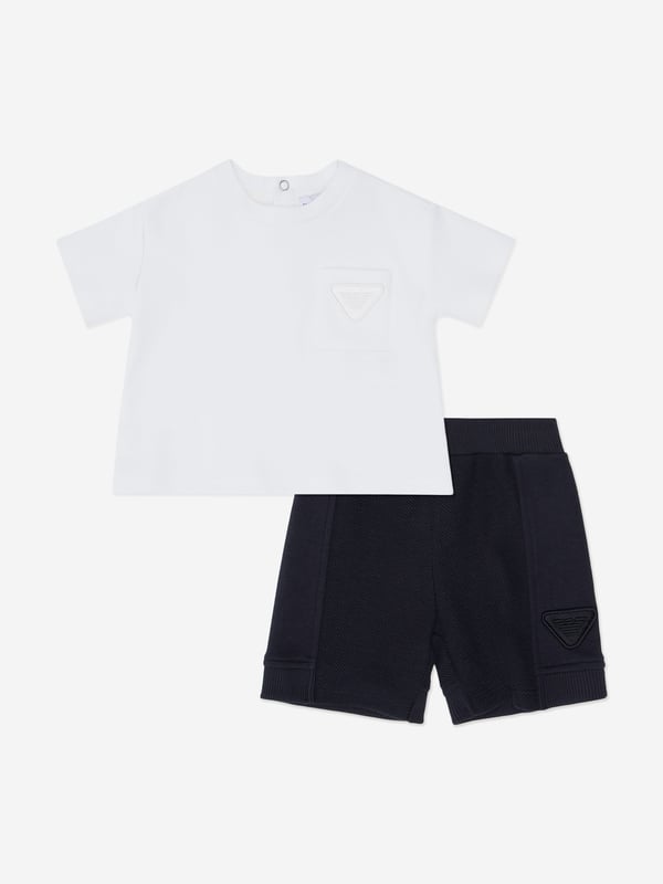 Presenting the exquisite Baby Boys Logo Short Set in Ivory by Emporio Armani a quintessential addition for your little gentlemans wardrobe for SS2025. Luxurious Craftsmanship Immaculately tailored with premium fabrics for unparalleled comfort. Signature Logo Detailing Features the iconic Emporio Armani logo, exuding a touch of class. Versatile Ivory Palette A soft, neutral colour perfect for any occasion, ensuring your boy stays in style. Breathable Fabric Ideal for keeping cool during warmer days, offering all-day comfort.Elevate your child's ensemble with this elegant short set from Emporio Armani. Shop now!